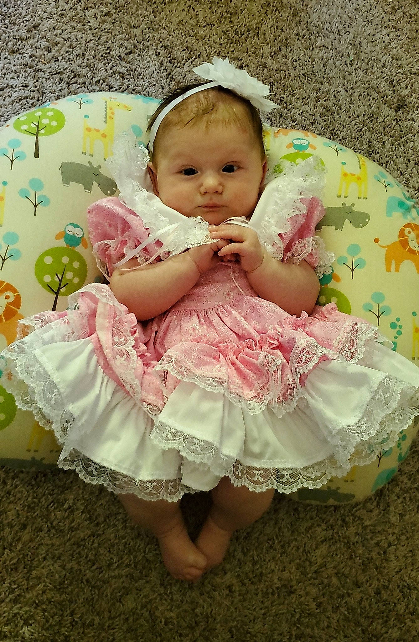 Joslyn is registered to the contest to win money with this photo: baby, baby_products, baby_toddler_clothing, child, dress, hair_accessory, person, pink, product, skin, toddler