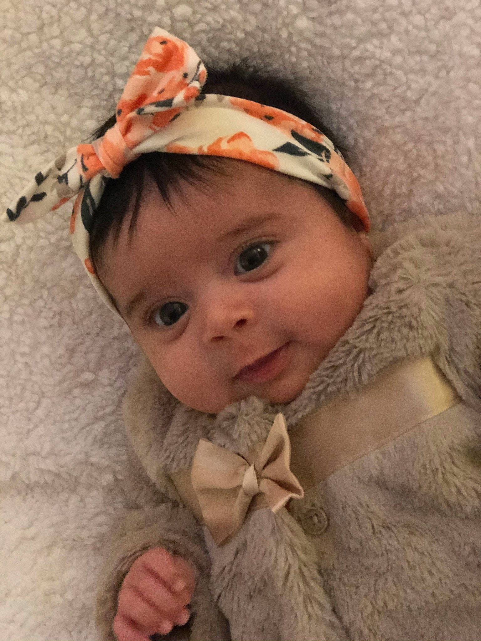 Luna is registered to the contest to win money with this photo: baby, baby_toddler_clothing, cheek, dress, eye, eyebrow, eyelash, fashion_accessory, hair_accessory, happy, head, headgear, headwear, human_body, iris, lip, neck, nose, person, skin