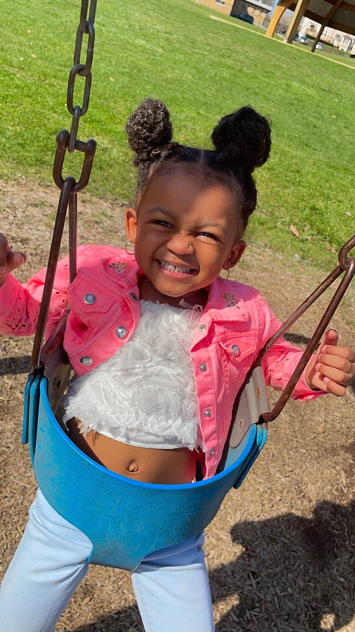 Majesty is registered to the contest to win money with this photo: child, facial_expression, fun, grass, hairstyle, happy, human, human_settlement, joy, leisure, mouth, people_in_nature, person, photograph, recreation, skin, smile, snapshot, summer, swing