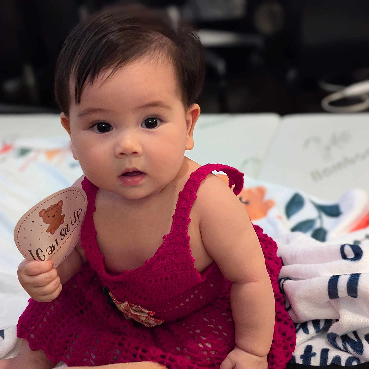 Myria joined the competition — help win amazing prizes! baby, blanket, bodypart, clothing, couch, cup, cutlery, dress, face, finger, furniture, hand, head, homedecor, linen, person, photography, portrait, sitting, text