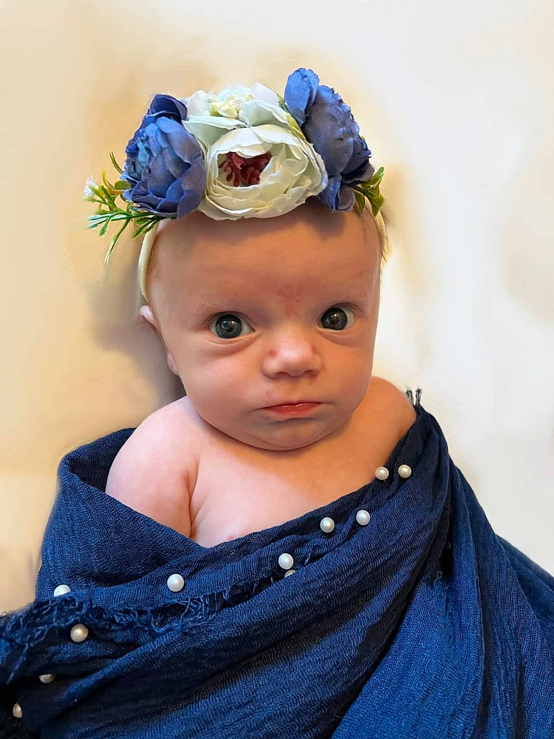 Veronica Rose is registered to the contest to win money with this photo: azure, baby, baby_toddler_clothing, cap, child, costume_hat, electric_blue, eye, flash_photography, flower, happy, hat, headband, headgear, headpiece, iris, jewellery, person, rose, sleeve