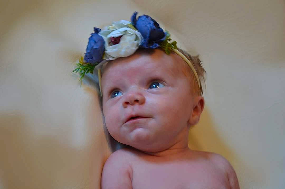 Veronica Rose is registered to the contest to win money with this photo: baby, baby_toddler_clothing, cheek, child, cut_flowers, eye, eyelash, fashion_accessory, flower, hair_accessory, happy, headband, headgear, headpiece, iris, jewellery, person, petal, rose, rose_family