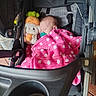 Elizabeth joined the competition — help win amazing prizes! baby, infant, sleeping, stroller, blanket, pink_blanket, polka_dots, plush_toy, stuffed_animal, carrot_toy, pacifier, portrait, indoors, child, cozy, seated, harness, fabric, baby_gear, photography