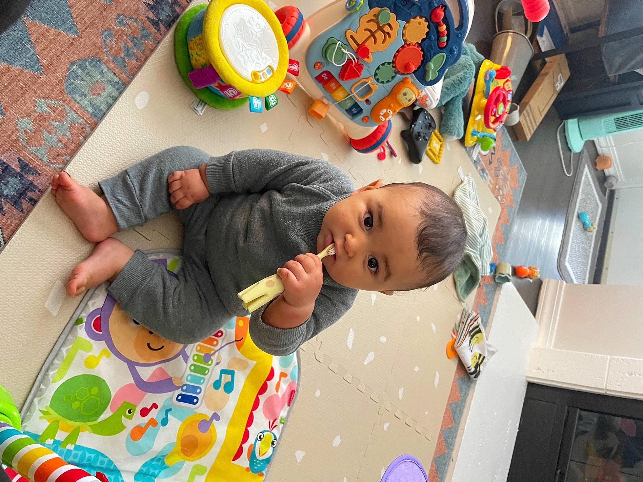 Kieran joined the competition — help win amazing prizes! baby, baby_products, baby_toddler_clothing, baby_toys, child, event, flooring, fun, happy, house, learning, leisure, party, pattern, person, play, room, sitting, toddler, toy