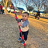 Gabriel joined the competition — help win amazing prizes! boy, child, clothing, face, grass, head, nature, outdoorplayarea, outdoors, pants, park, person, photography, plant, playarea, portrait, soil, tree, vegetation, walking