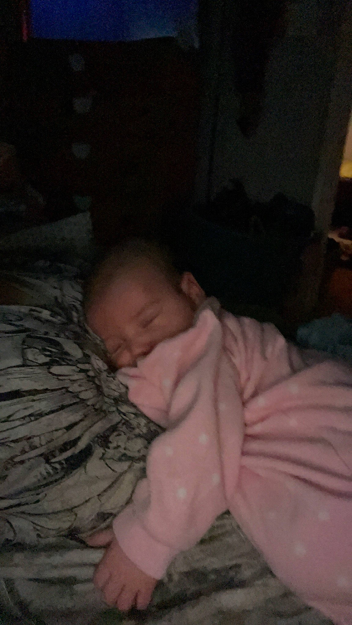 Athena is registered to the contest to win money with this photo: baby, baby_toddler_clothing, bedding, bedtime, cheek, child, comfort, darkness, eye, flesh, fun, linens, nap, nose, person, room, sitting, sleep, thumb, toddler