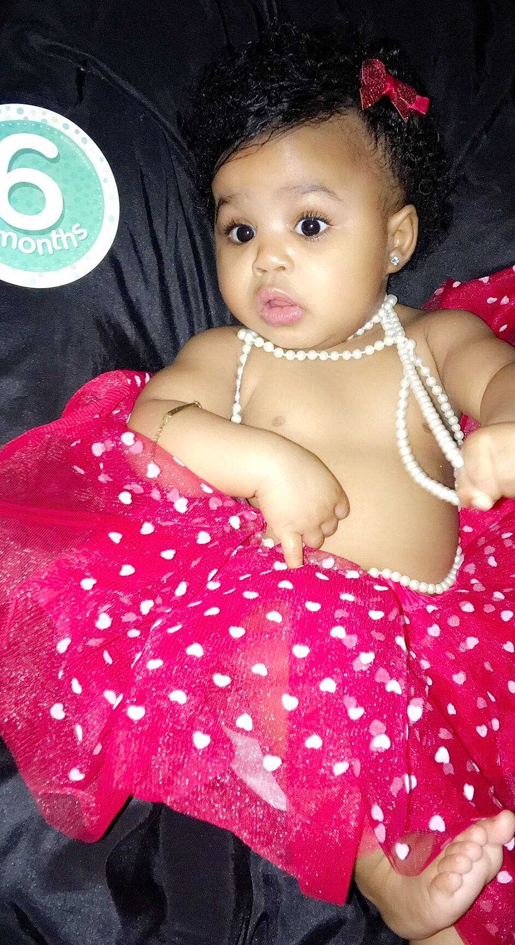 O'Miya is registered to the contest to win money with this photo: abdomen, beauty, black_hair, cheek, child, child_model, eye, fun, girl, happiness, human, infant, lip, person, pink, red, shoulder, skin, smile, toddler