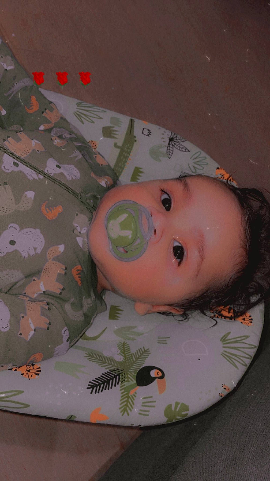 Ace is registered to the contest to win money with this photo: baby, baby_products, bib, camouflage, carmine, cheek, child, circle, eye, eyelash, flooring, fun, head, military_camouflage, pattern, person, pink, skin, textile, toddler
