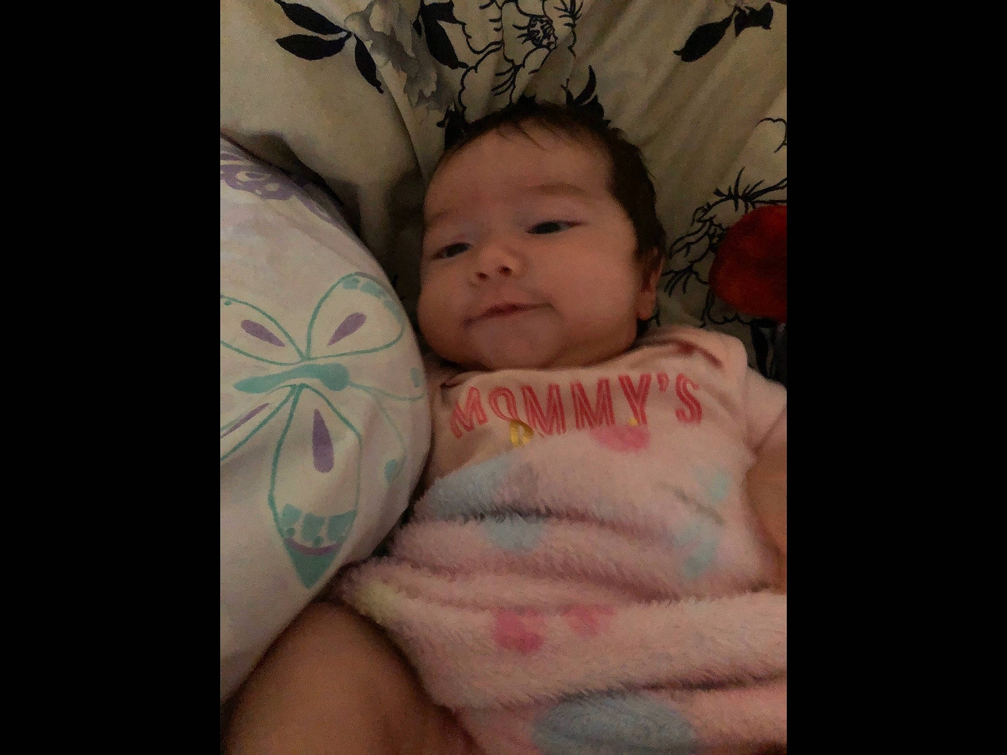 Macy is registered to the contest to win money with this photo: arm, baby, bedtime, cheek, child, eye, face, facial_expression, finger, forehead, head, human, iris, lip, mouth, nap, nose, person, skin, sleep