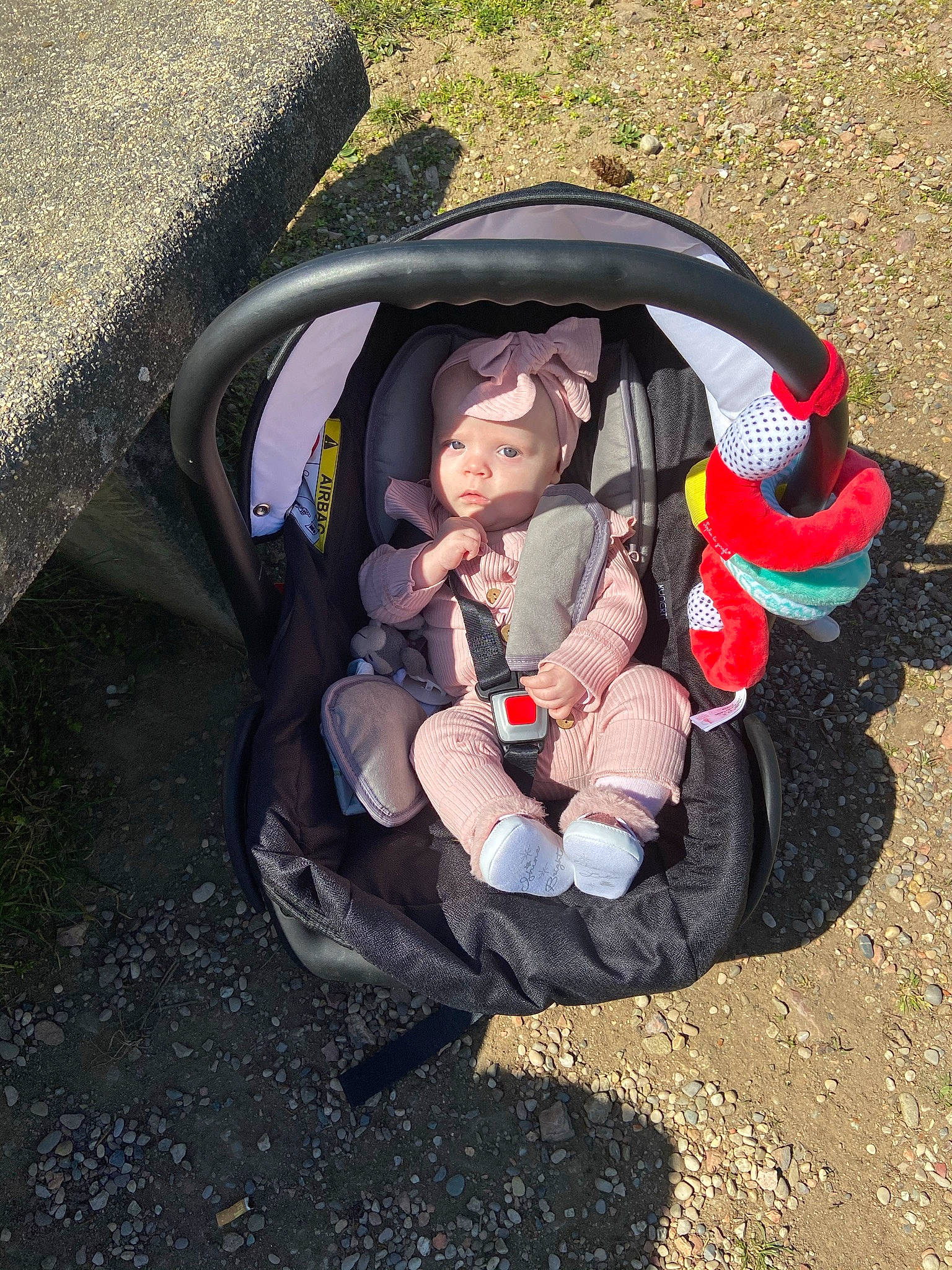 Kayla participe au concours pour gagner de l'argent avec cette photo : adventure, auto_part, baby, baby_carriage, baby_products, bag, baggage, carmine, child, comfort, fashion_accessory, fun, grass, headwear, leisure, luggage_and_bags, people_in_nature, person, recreation, sitting