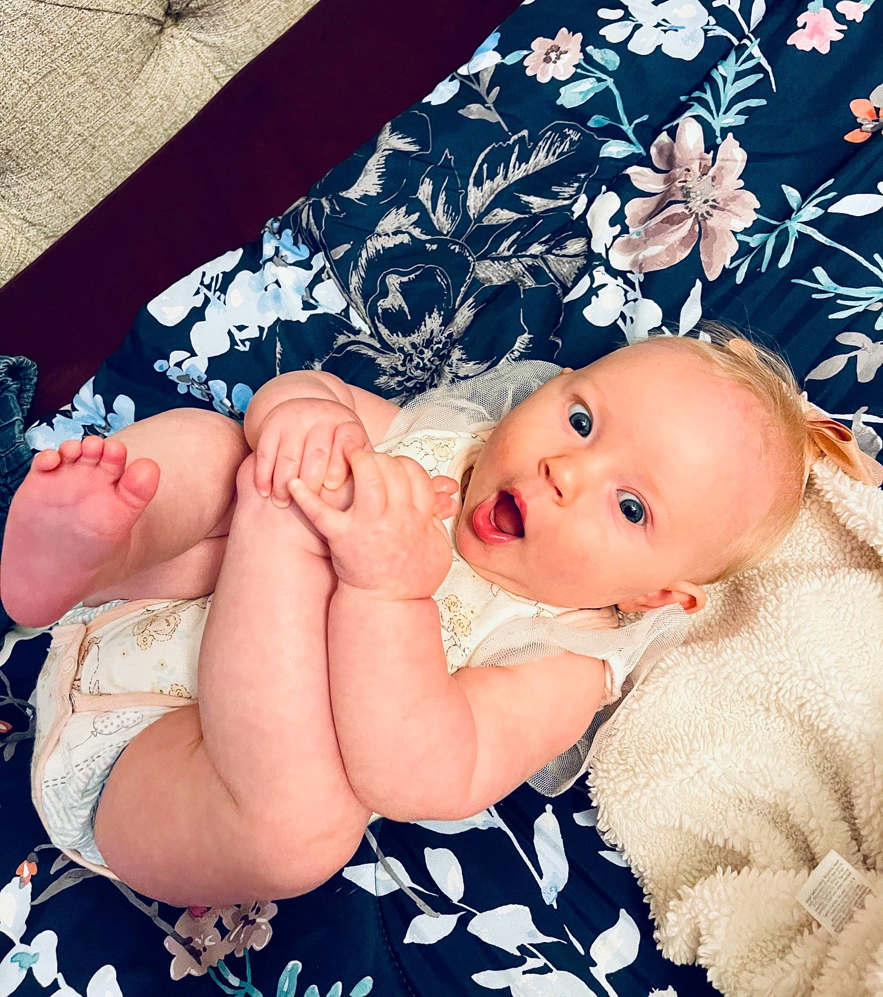 Sterling joined the competition — help win amazing prizes! azure, baby, baby_sleeping, baby_toddler_clothing, blue, cheek, child, comfort, finger, foot, gesture, hand, happy, pattern, person, pink, skin, stomach, surprise, textile