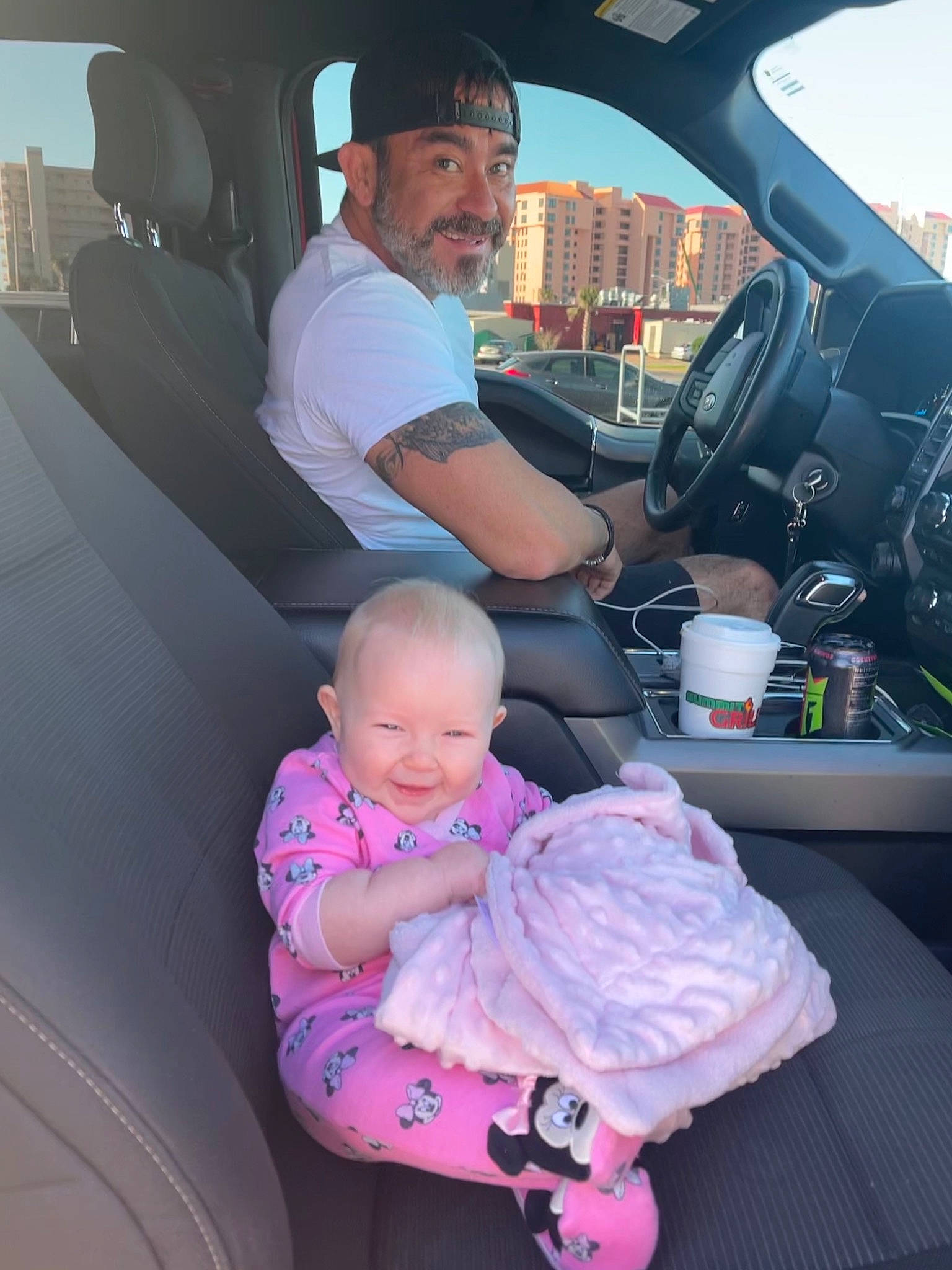 Sterling is registered to the contest to win money with this photo: auto_part, automotive_design, automotive_exterior, baby, baby_toddler_clothing, car, car_seat, car_seat_cover, child, comfort, head_restraint, headwear, joy, lap, motor_vehicle, person, personal_luxury_car, product, steering_wheel, toddler