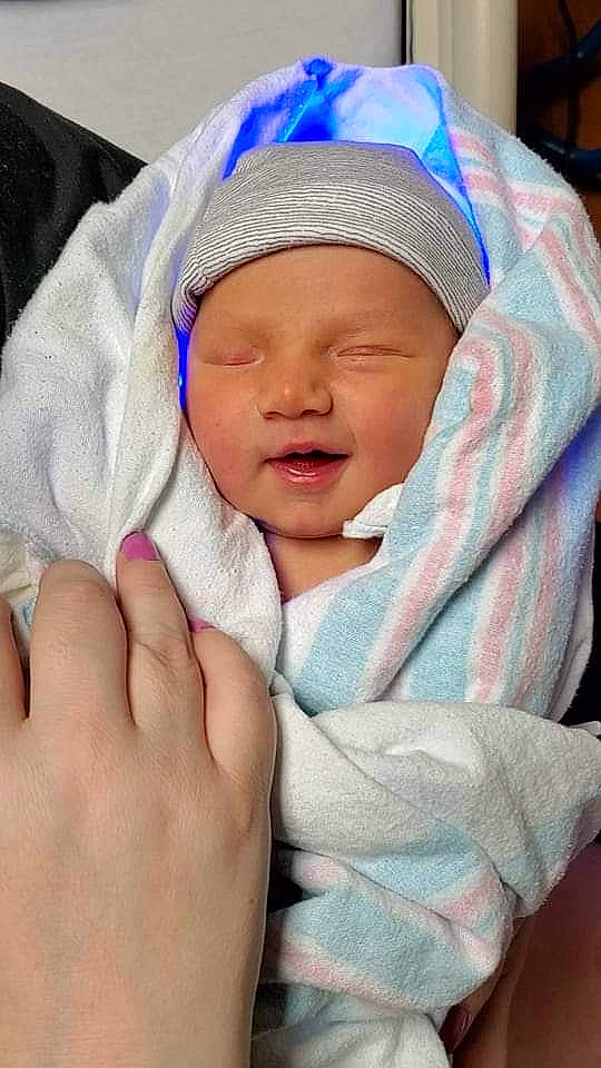 Aria is registered to the contest to win money with this photo: baby, baby_products, baby_sleeping, baby_toddler_clothing, cap, child, childbirth, comfort, face, finger, gesture, hat, headwear, linens, nail, person, room, service, skin, thumb