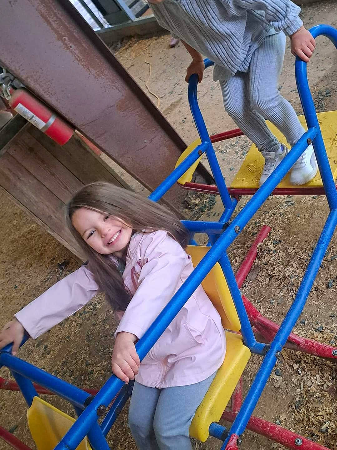 Mckenzie is registered to the contest to win money with this photo: blue, child, chute, city, electric_blue, fun, grass, joy, leisure, outdoor_play_equipment, outdoor_recreation, person, photograph, playground, playground_slide, recreation, sculpture, smile, snapshot, statue