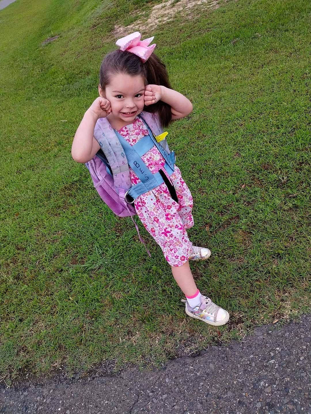 Mckenzie is registered to the contest to win money with this photo: baby_toddler_clothing, child, eye, fun, gesture, grass, grass_family, grassland, happy, joy, lawn, leisure, meadow, people_in_nature, person, pink, plant, recreation, smile, soil