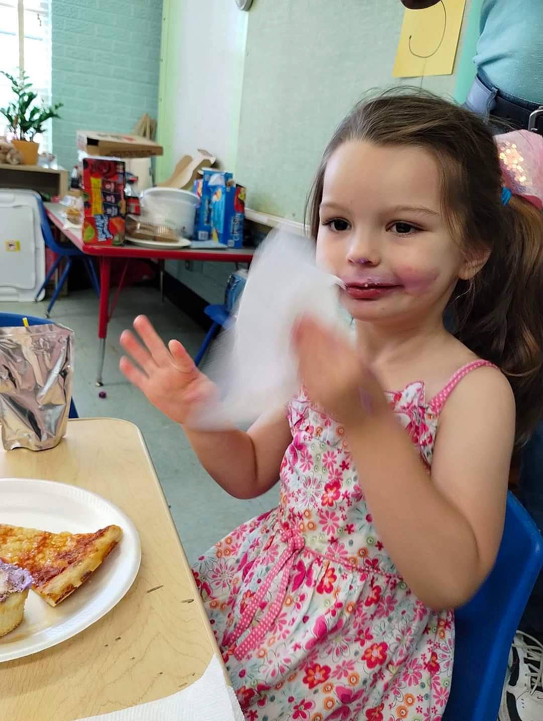 Mckenzie is registered to the contest to win money with this photo: baking, chair, child, comfort_food, cooking, dish, finger_food, food, food_craving, happy, joy, junk_food, person, plate, recipe, sitting, smile, t_shirt, table, tableware