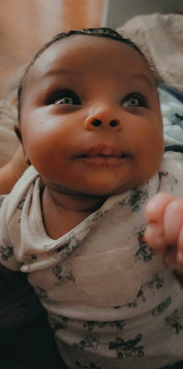 Journeigh is registered to the contest to win money with this photo: baby, baby_toddler_clothing, cheek, chin, ear, eyebrow, eyelash, finger, forehead, gesture, happy, iris, lip, mammal, mouth, neck, nose, person, skin, sleeve