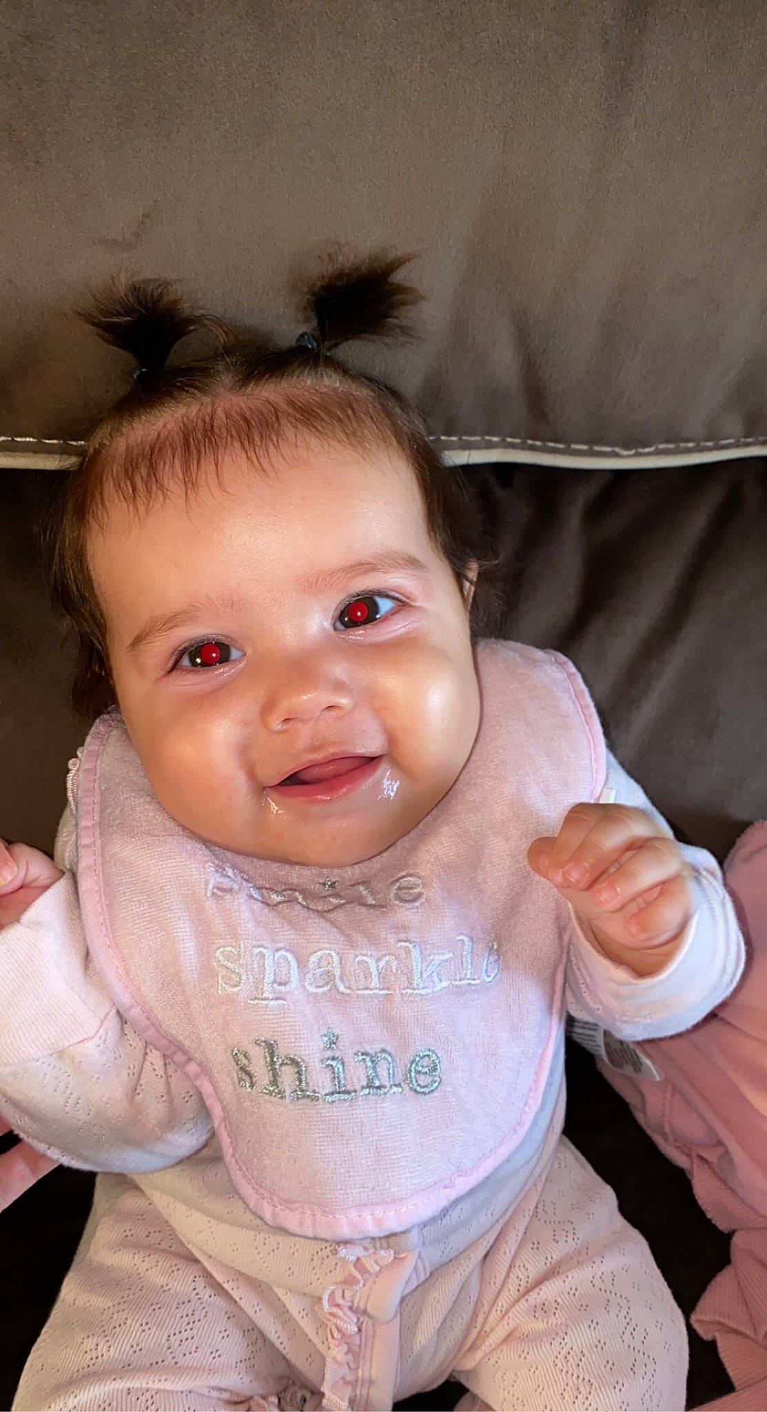 Jezebel is registered to the contest to win money with this photo: baby, baby_toddler_clothing, bib, cheek, ear, eyelash, face, finger, gesture, happy, head, iris, lip, neck, nose, person, skin, sleeve, smile, thumb