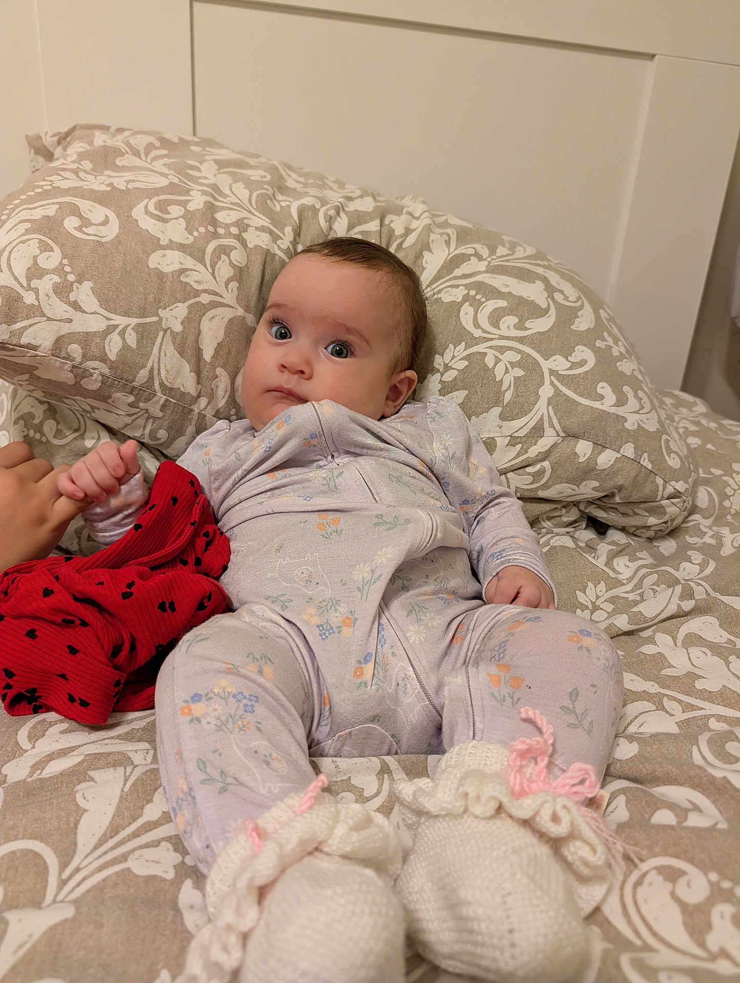 Tomris Aden joined the competition — help win amazing prizes! baby, infant, bed, pillow, blanket, onesie, booties, hand, pattern, floral, clothing, fabric, cute, child, indoor, person, portrait, sleepwear, resting, soft