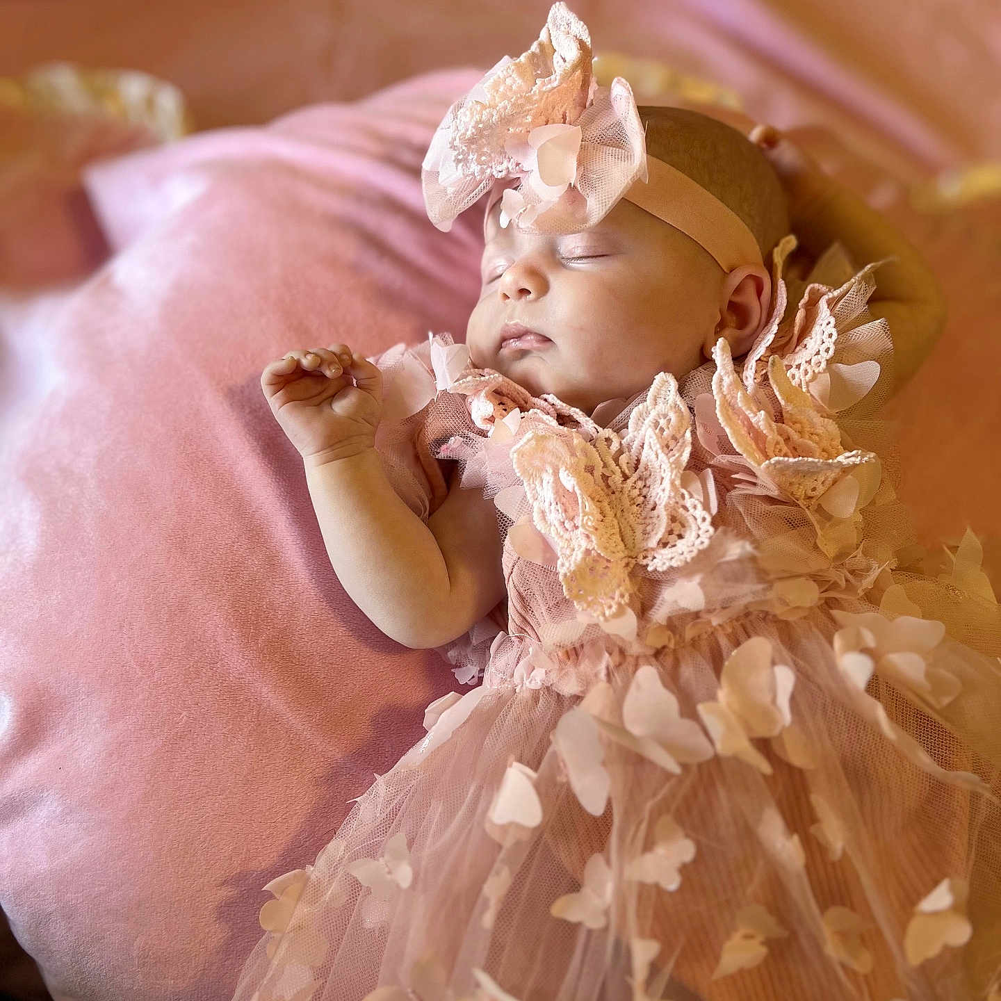 Addison is registered to the contest to win money with this photo: baby, bodypart, bonnet, cap, clothing, dress, face, finger, flower, flowerarrangement, flowerbouquet, hand, hat, head, newborn, person, photography, plant, portrait, sleeping