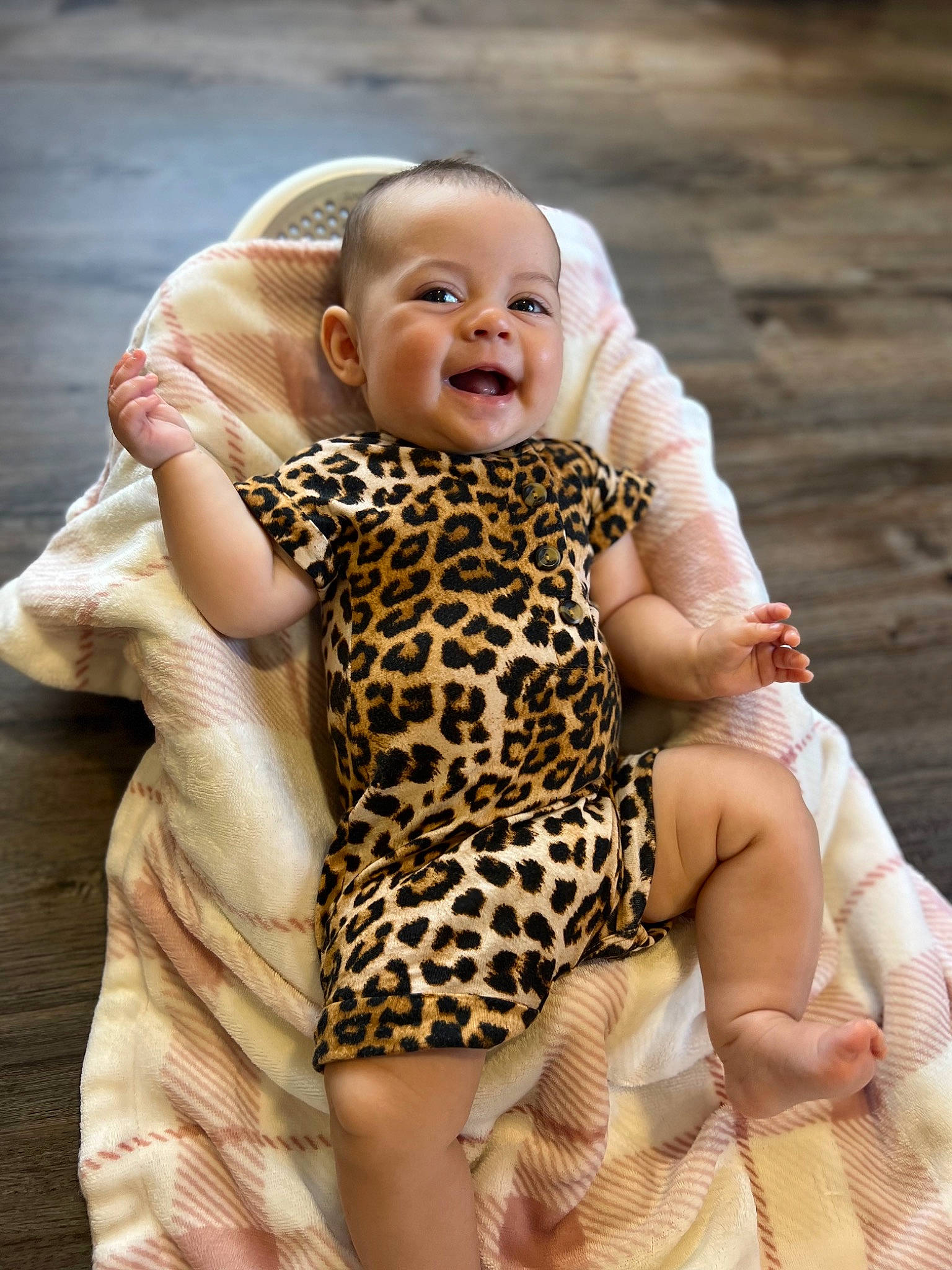 Aislynn is registered to the contest to win money with this photo: baby, baby_toddler_clothing, blond, child, eye, face, flash_photography, fun, gesture, happy, human_leg, infant_bodysuit, one_piece_garment, people_in_nature, person, skin, sleeve, smile, thigh, thumb