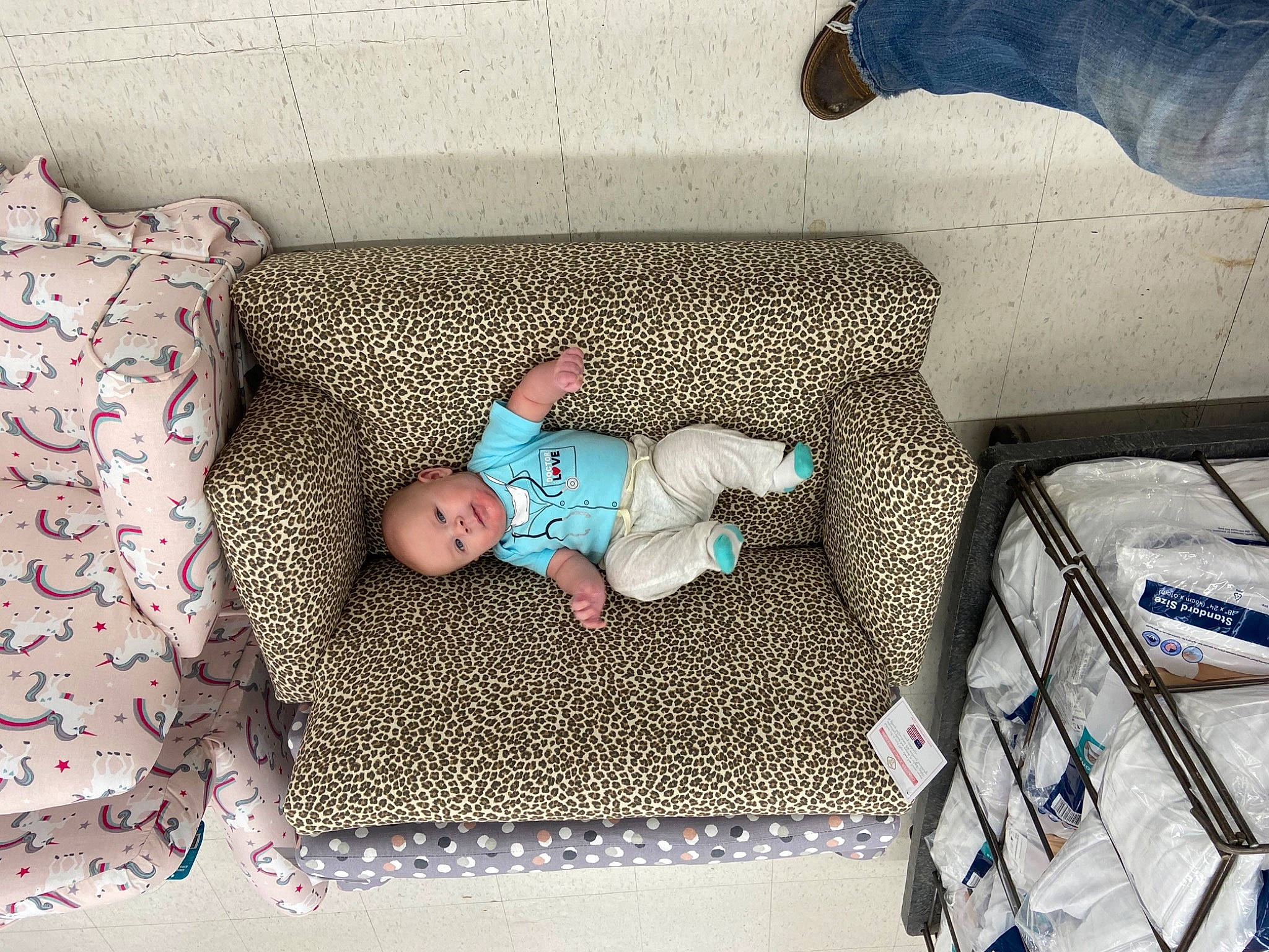 Myron is registered to the contest to win money with this photo: baby, baby_products, baby_safety, baby_toddler_clothing, baby_toys, bed, bedding, box, comfort, foot, infant_bed, linens, nightwear, pattern, person, sock, toddler