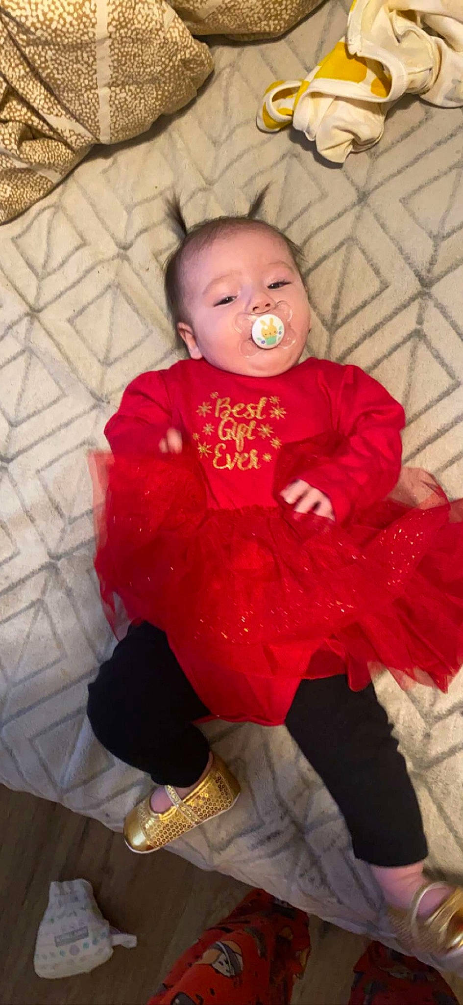 Mckenzie joined the competition — help win amazing prizes! baby, baby_toddler_clothing, cheek, child, clothing, comfort, face, fun, happy, iris, magenta, mouth, person, pink, room, sandal, sitting, skin, sleeve, textile