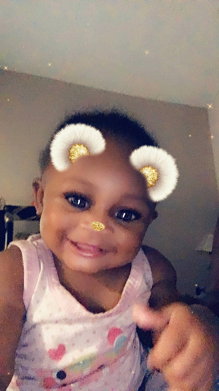 Faith is registered to the contest to win money with this photo: black_hair, cheek, child, ear, eyebrow, face, forehead, hair, head, joy, nose, person, selfie, smile, toddler