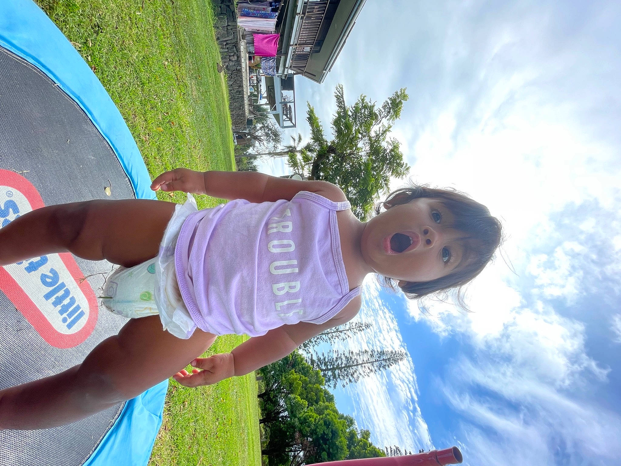 Tylin-rae is registered to the contest to win money with this photo: baby_toddler_clothing, blue, cloud, cool, fun, grass, green, happy, hat, leisure, magenta, people_in_nature, person, pink, plant, recreation, sky, sunlight, surprise, toddler