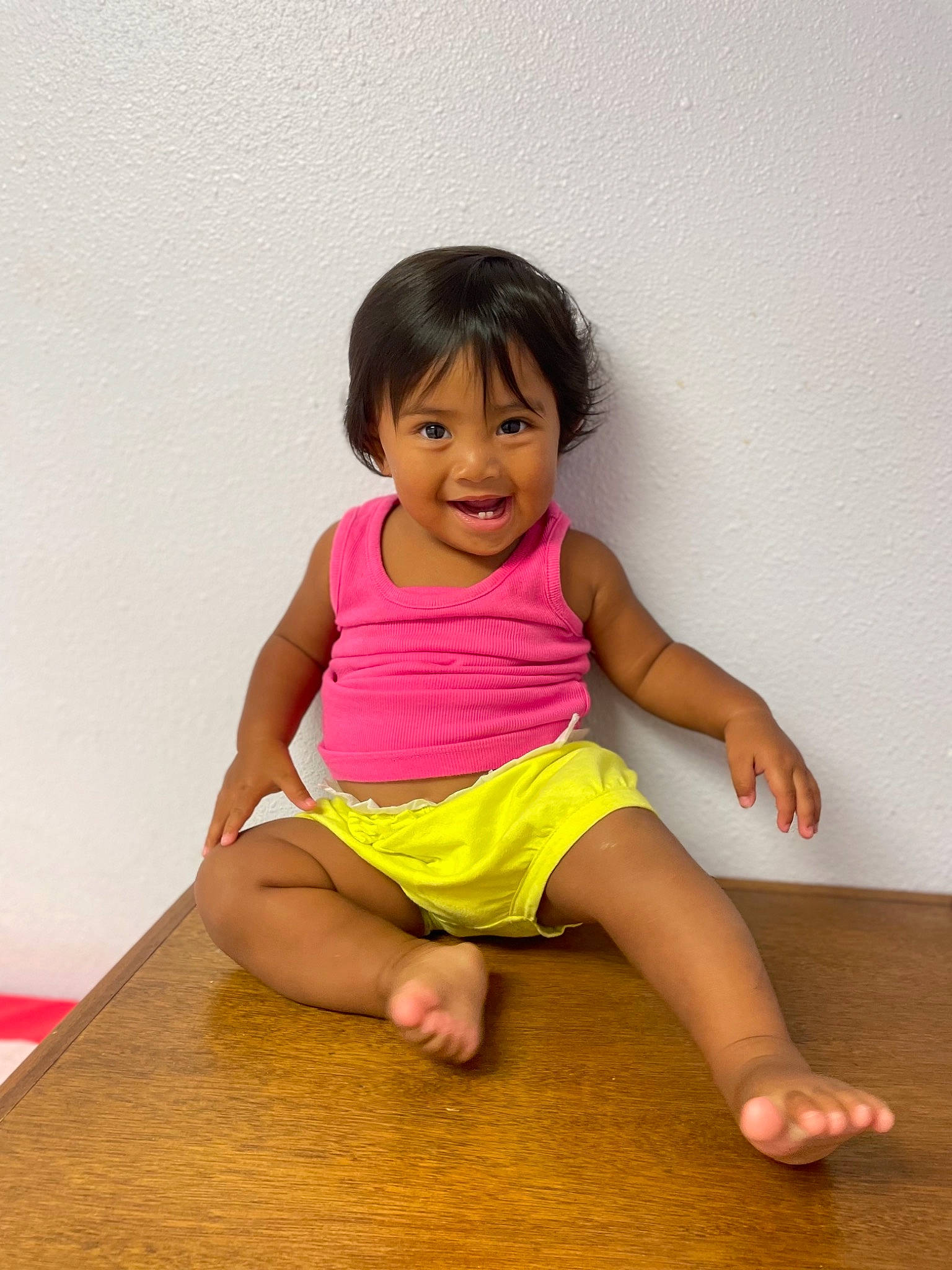 Tylin-rae is registered to the contest to win money with this photo: baby_toddler_clothing, barefoot, cheek, chin, dress, eye, face, flooring, happy, head, human_body, human_leg, joy, leg, neck, person, shoulder, skin, sleeve, t_shirt