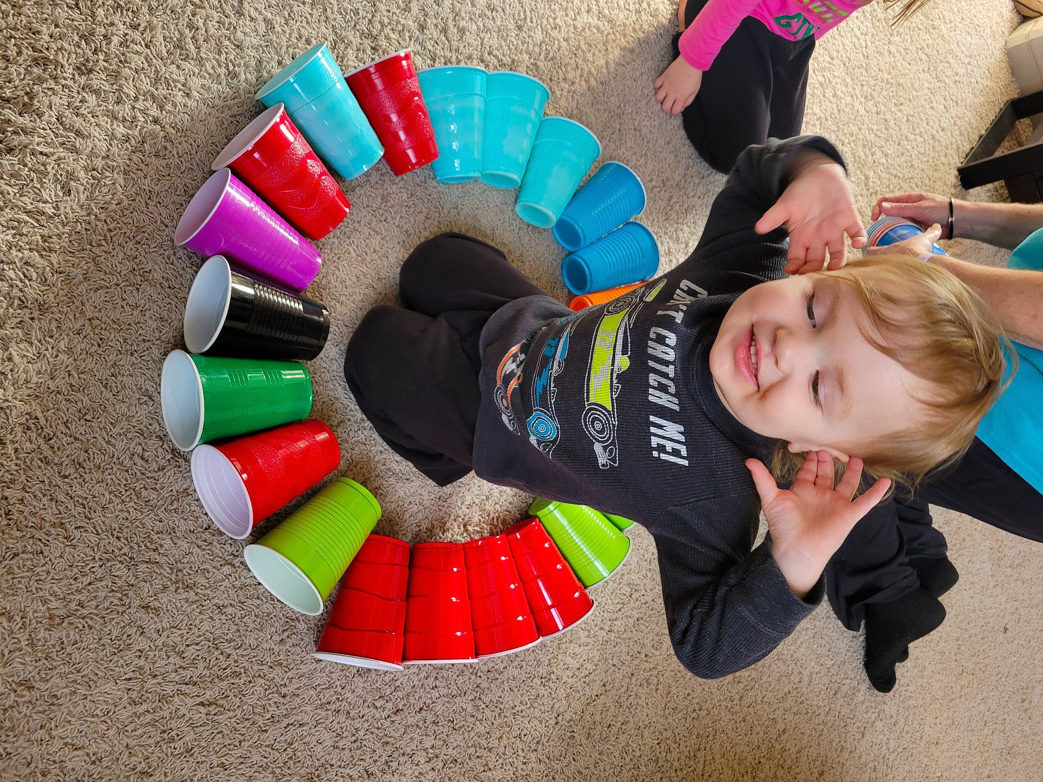 Kasen is registered to the contest to win money with this photo: auto_part, automotive_wheel_system, circle, event, fashion_accessory, fun, happy, joy, leisure, person, play, recreation, smile, toddler, toy