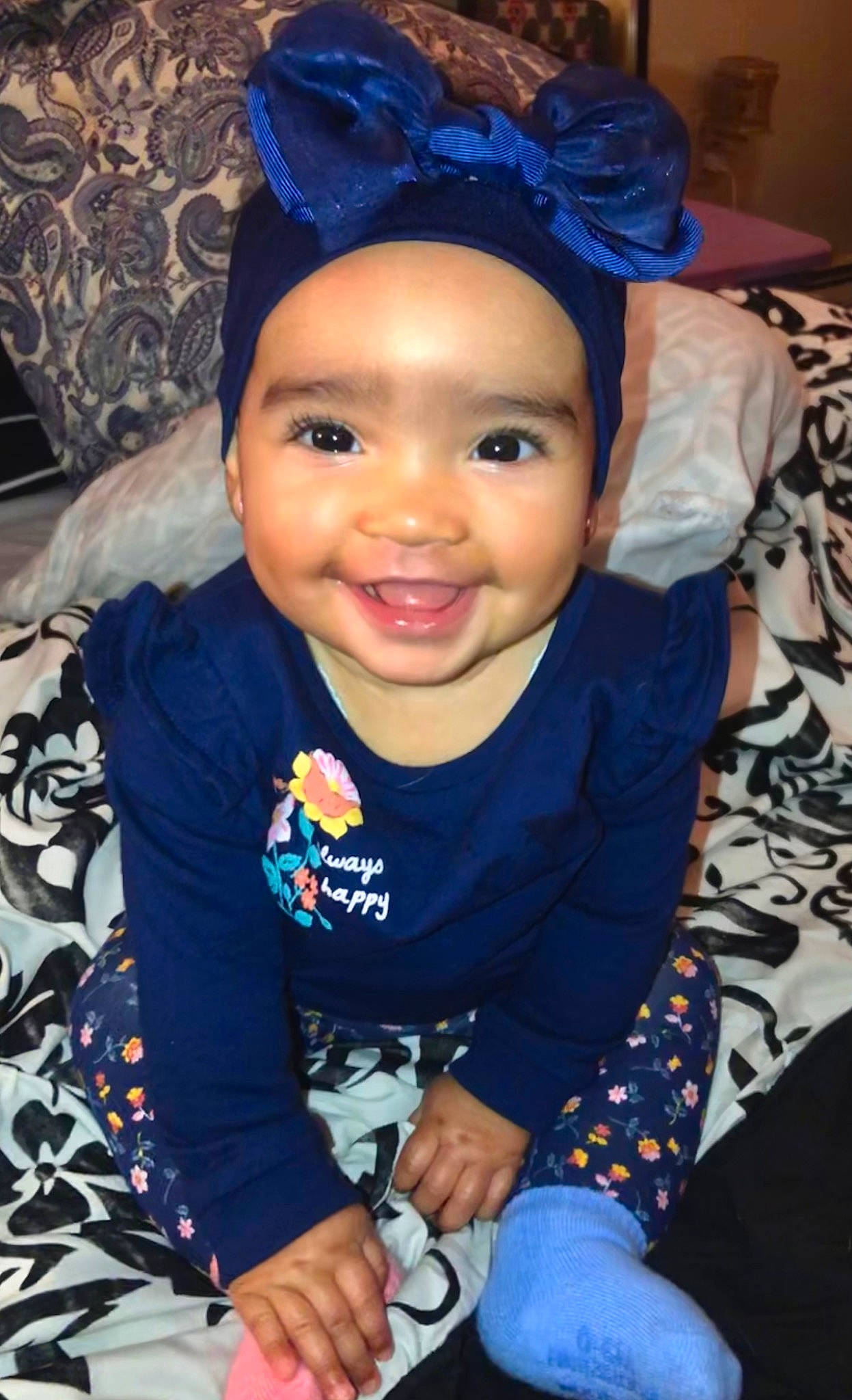 Avayah joined the competition — help win amazing prizes! arm, baby_toddler_clothing, black, blue, cheek, chin, clothing, eye, eyebrow, face, forehead, happy, head, headwear, iris, joy, lip, person, purple, skin