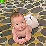 Brynnleigh joined the competition — help win amazing prizes! baby, bare_chest, blue_eyes, carpet, child, cute, face, floor, hands, head, indoors, infant, lying_down, patterned_rug, person, playtime, skin, smile, white_pants, young