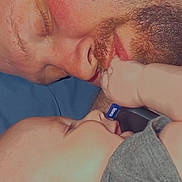 Bjorn joined the competition — help win amazing prizes! affection, baby, beard, child, closeup, cuddle, digital_clock, face, gray_shirt, head, indoor, intimacy, love, man, phone_screen, portrait, skin, sleeping, technology, time