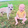 Bjorn joined the competition — help win amazing prizes! baby, child, dog, grass, outdoor, field, blue_eyes, yellow_shirt, smiling, sitting, pet, canine, nature, happy, summer, cute, grass_field, barefoot, animal, human
