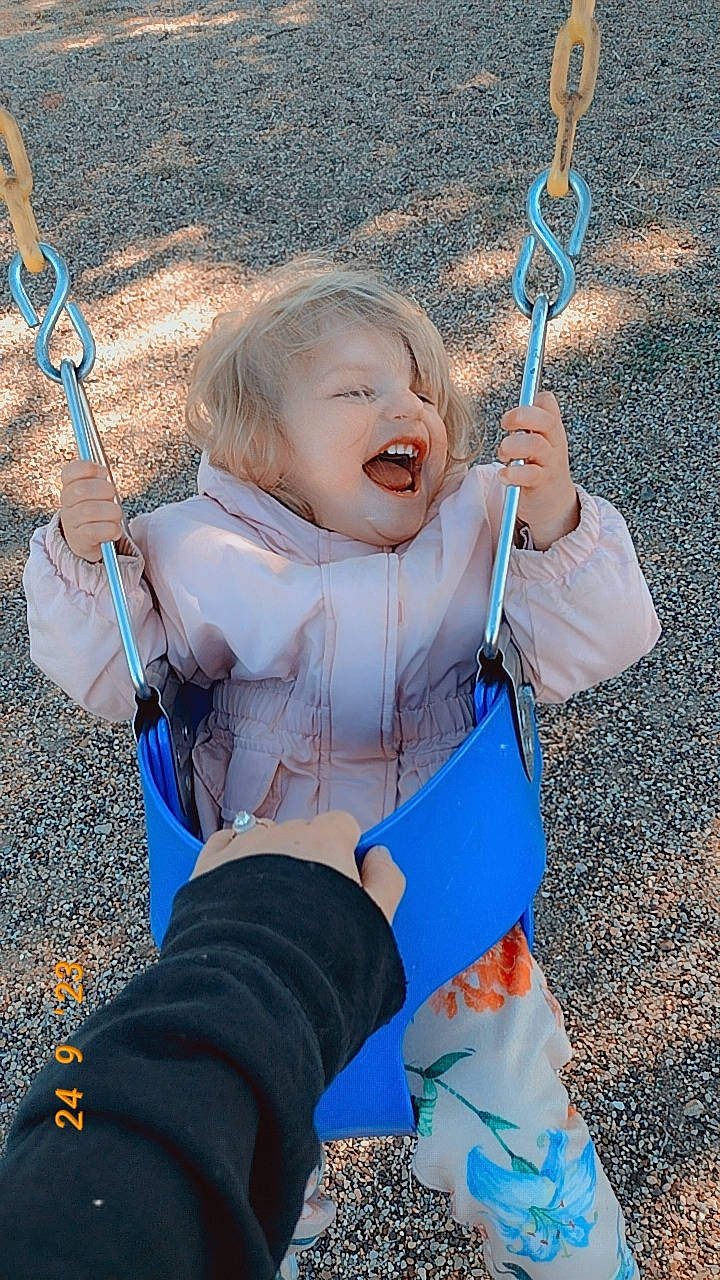 Mckinley joined the competition — help win amazing prizes! arm, azure, baby, beauty, blue, electric_blue, eye, fun, gesture, grass, happy, human_body, leisure, people_in_nature, person, playground, public_space, skin, smile, swing