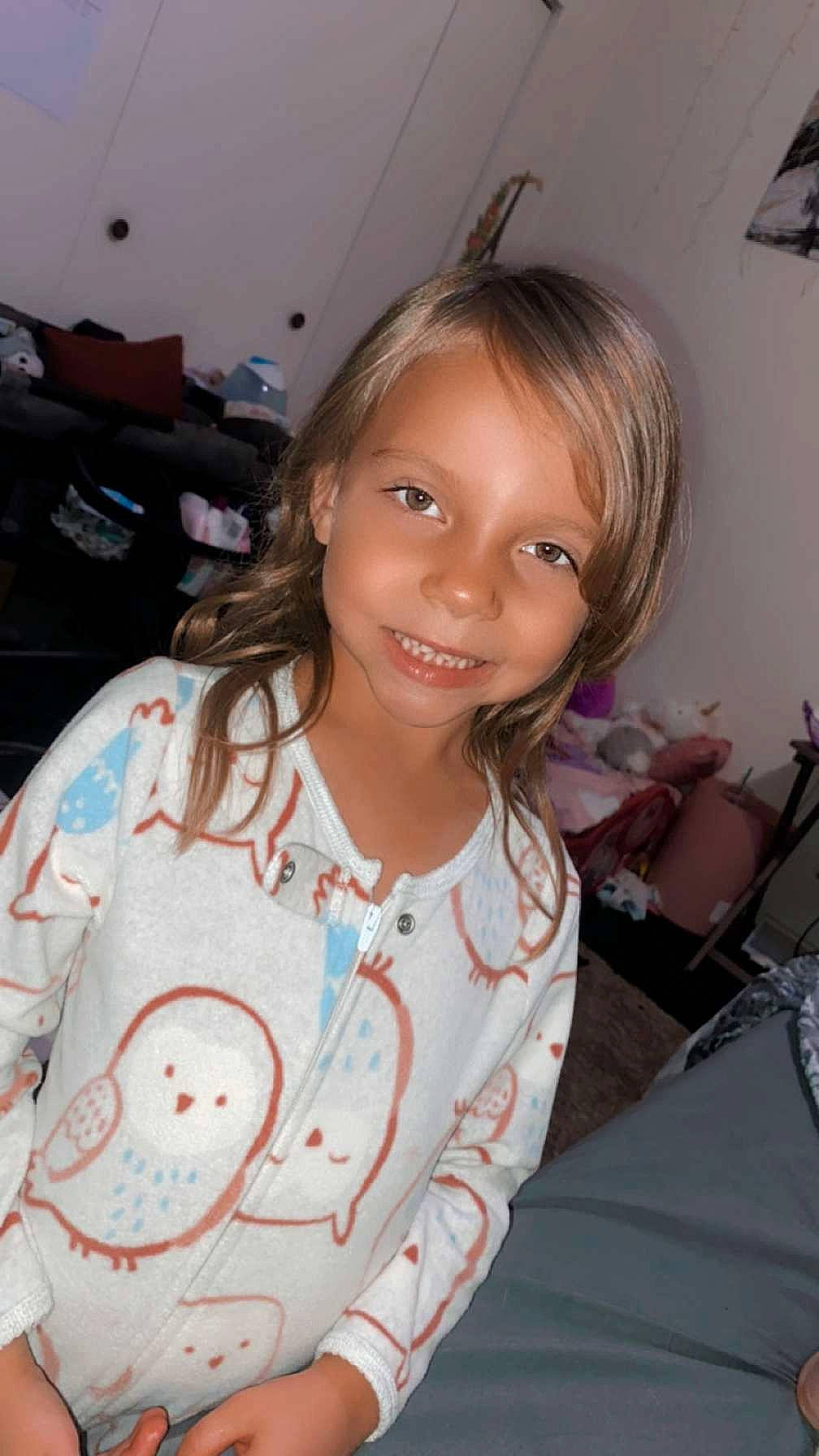 Laylony is registered to the contest to win money with this photo: bangs, brown_hair, chair, cheek, child, event, eyelash, fun, hairstyle, happy, iris, joy, lip, pattern, person, pink, room, skin, sleeve, smile