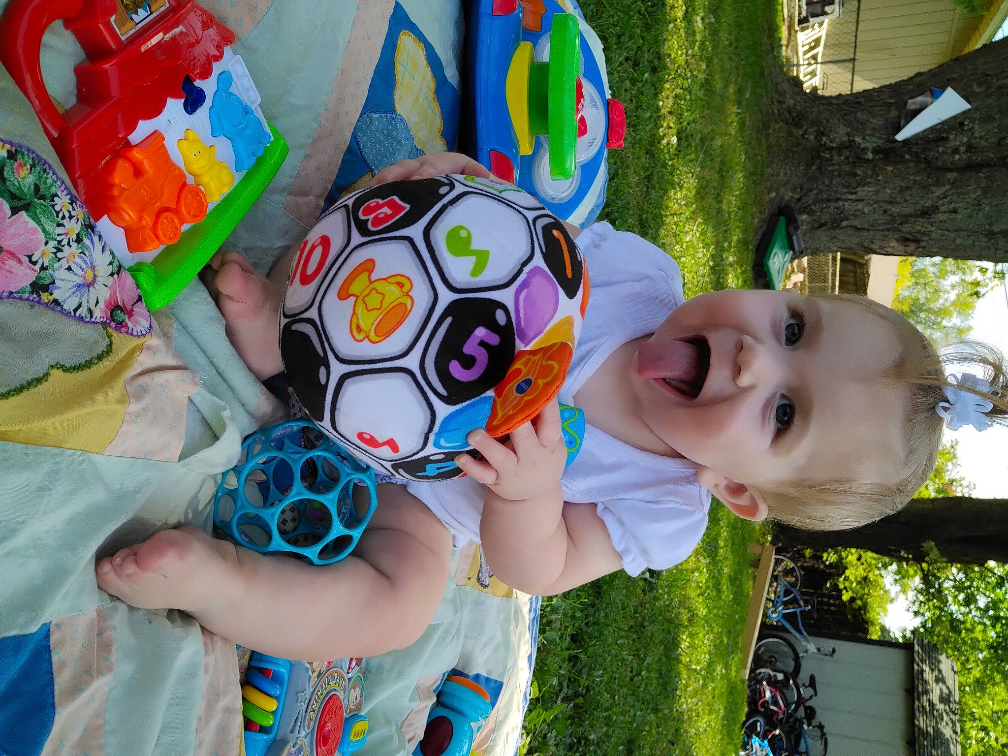 Charlee joined the competition — help win amazing prizes! baby_toddler_clothing, child, fun, grass, green, happy, leisure, light, party_supply, people, person, plant, recreation, red, smile, summer, toddler, toy, white, world