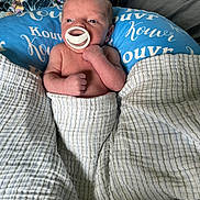 Christopher is registered to the contest to win money with this photo: baby, newborn, blanket, pacifier, cushion, infant, bed, sleeping, soft, comfort, rest, child, wrapped, clothing, portrait, head, skin, hand, lying, indoor