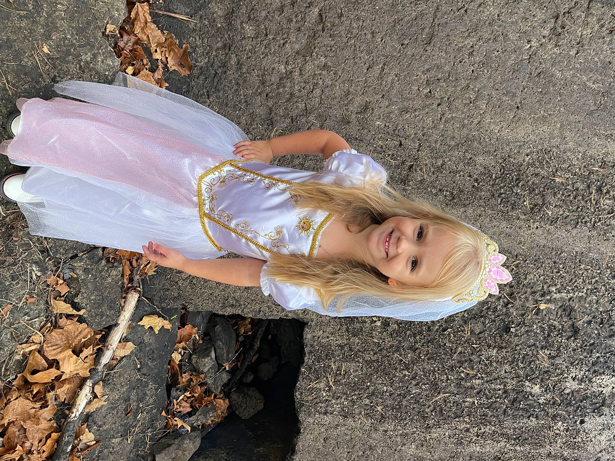 Zoey joined the competition — help win amazing prizes! asphalt, dress, fashion_accessory, fun, grass, happy, human_leg, joy, landscape, people_in_nature, person, shadow, sitting, soil, tree, wood