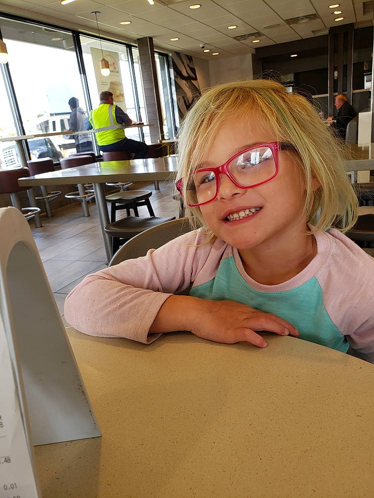 Kendhyl is registered to the contest to win money with this photo: blond, eyewear, glasses, joy, person, sitting, smile, vision_care