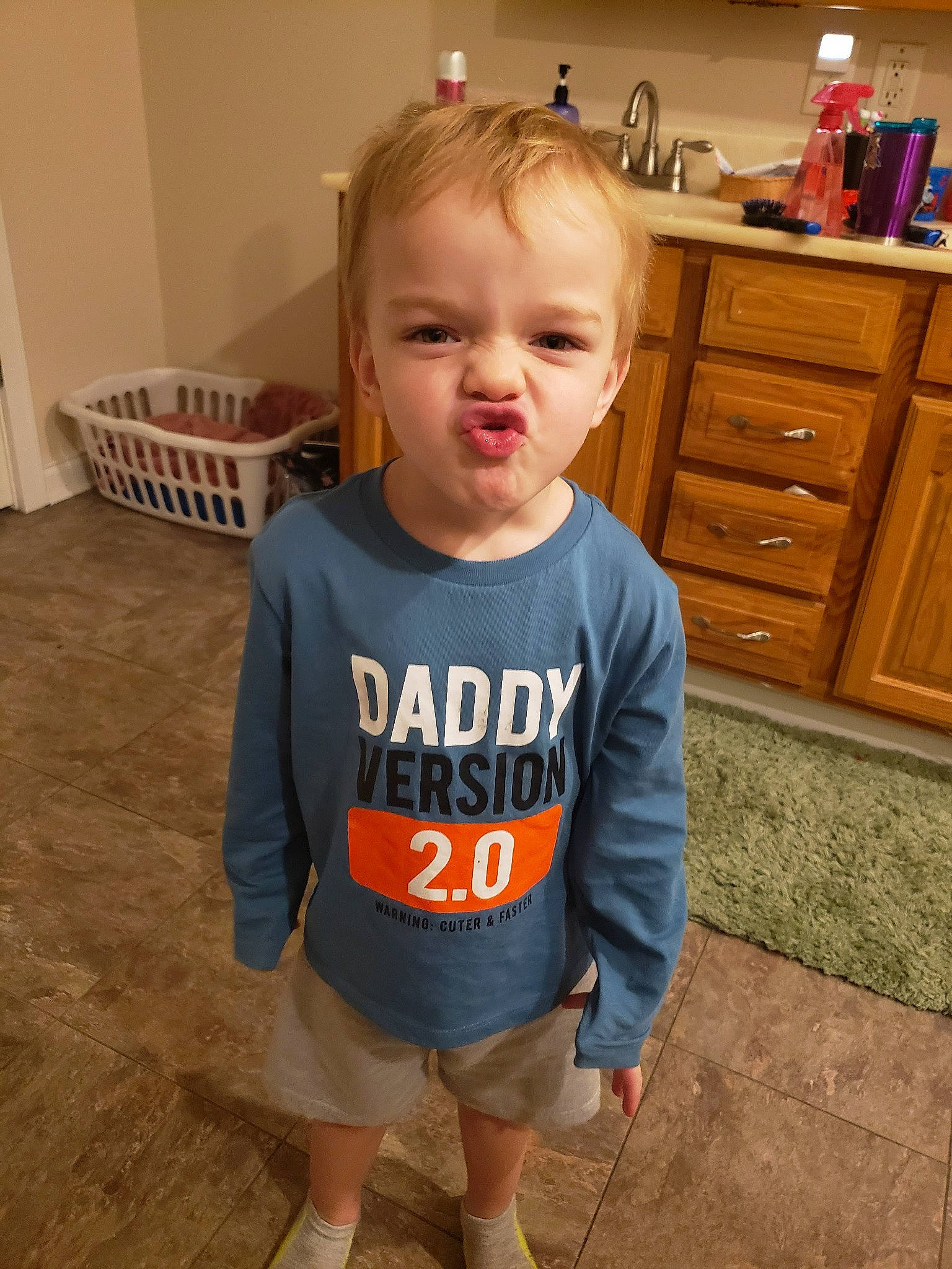 Karsyn joined the competition — help win amazing prizes! baby_toddler_clothing, cheek, child, cool, floor, flooring, outerwear, person, play, product, skin, sleeve, smile, standing, t_shirt, toddler, top