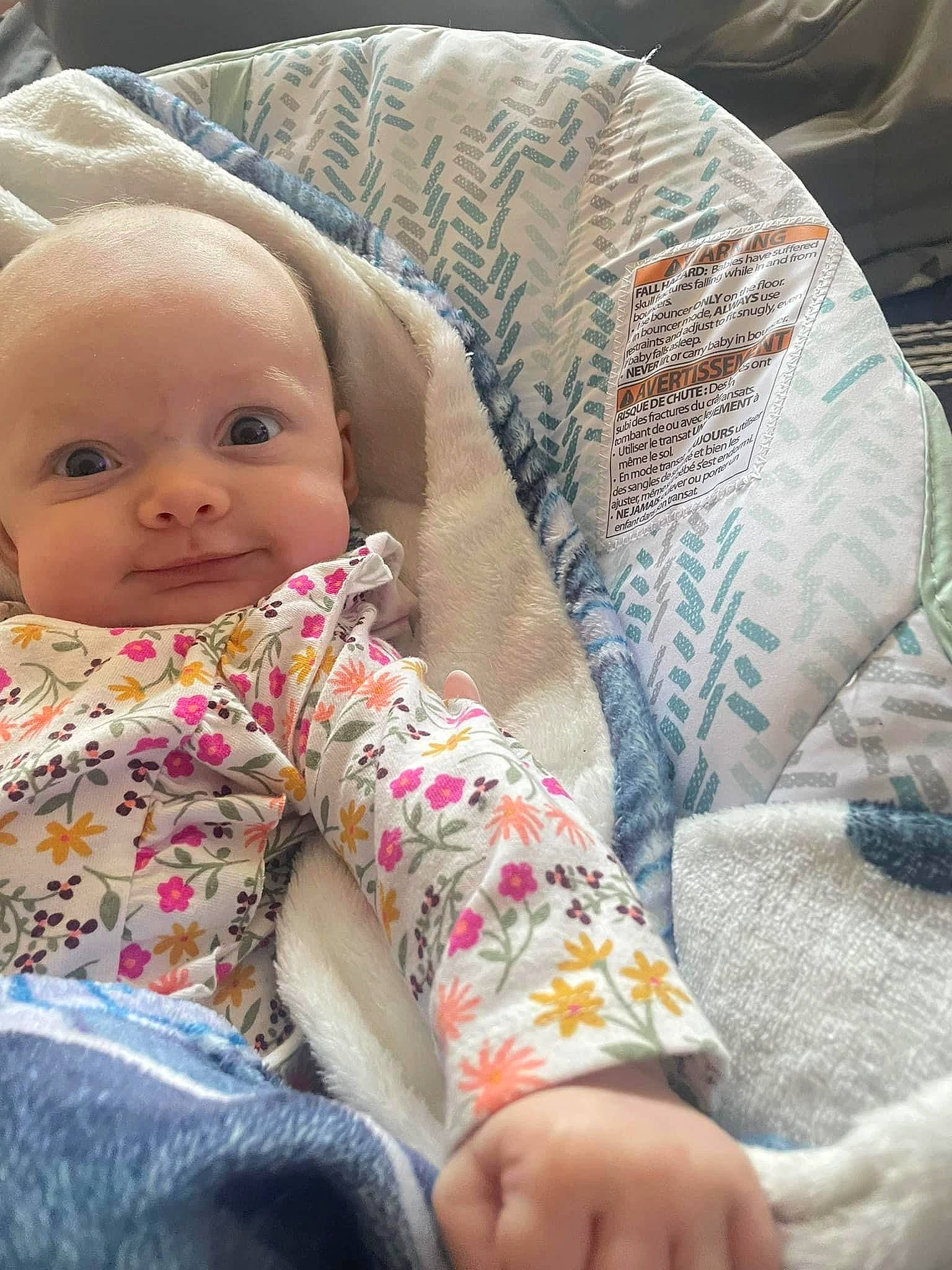 Sophia is registered to the contest to win money with this photo: baby, child, comfort, cool, couch, finger, foot, human_body, human_leg, lap, leg, linens, mammal, mouth, person, skin, sleeve, textile, thigh, toddler