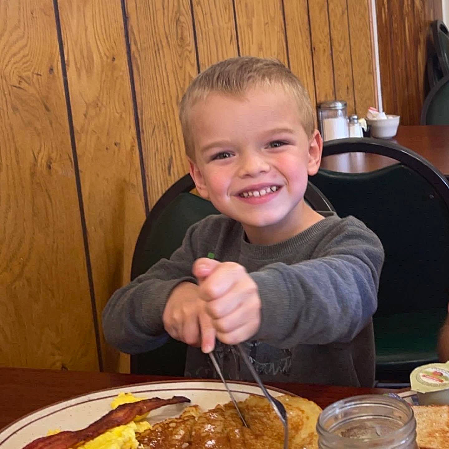 Karsyn is registered to the contest to win money with this photo: cake, chair, child, comfort_food, cuisine, dish, fast_food, food, food_craving, fork, fried_food, ingredient, joy, junk_food, person, plate, platter, sharing, smile, table