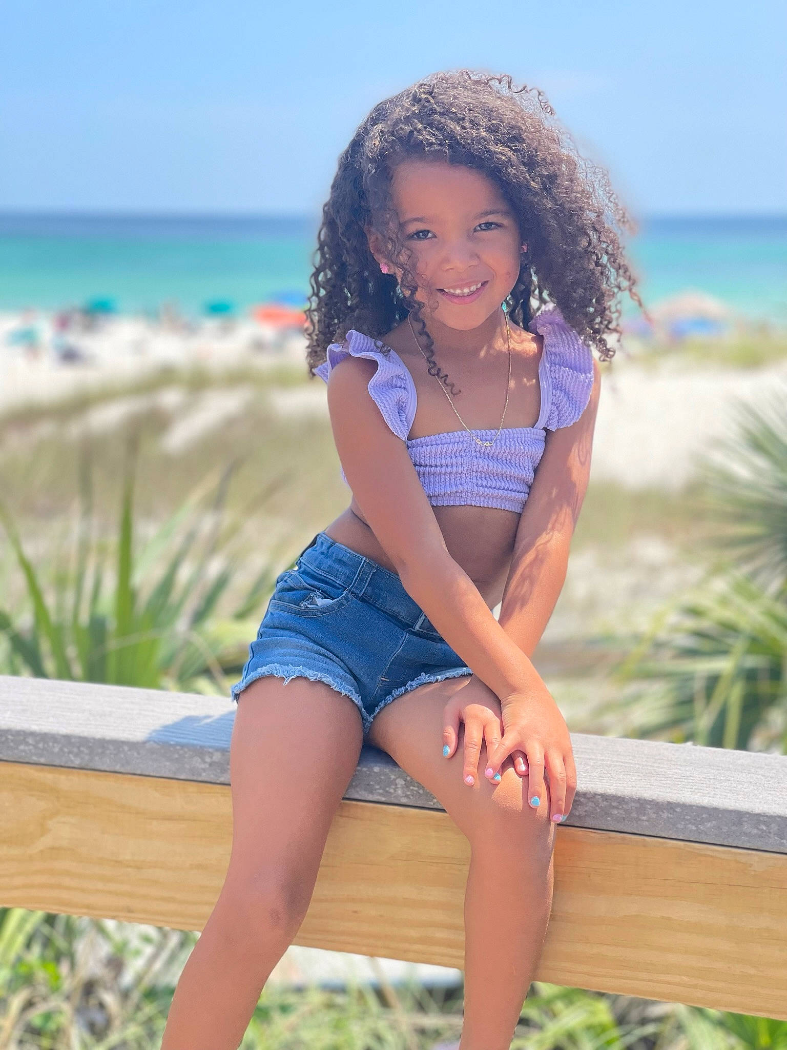 Maliyah is registered to the contest to win money with this photo: black_hair, clothing, face, fashion, flash_photography, hair, happy, human_body, joy, leg, leisure, people_in_nature, person, plant, shorts, skin, sky, smile, summer, sunlight