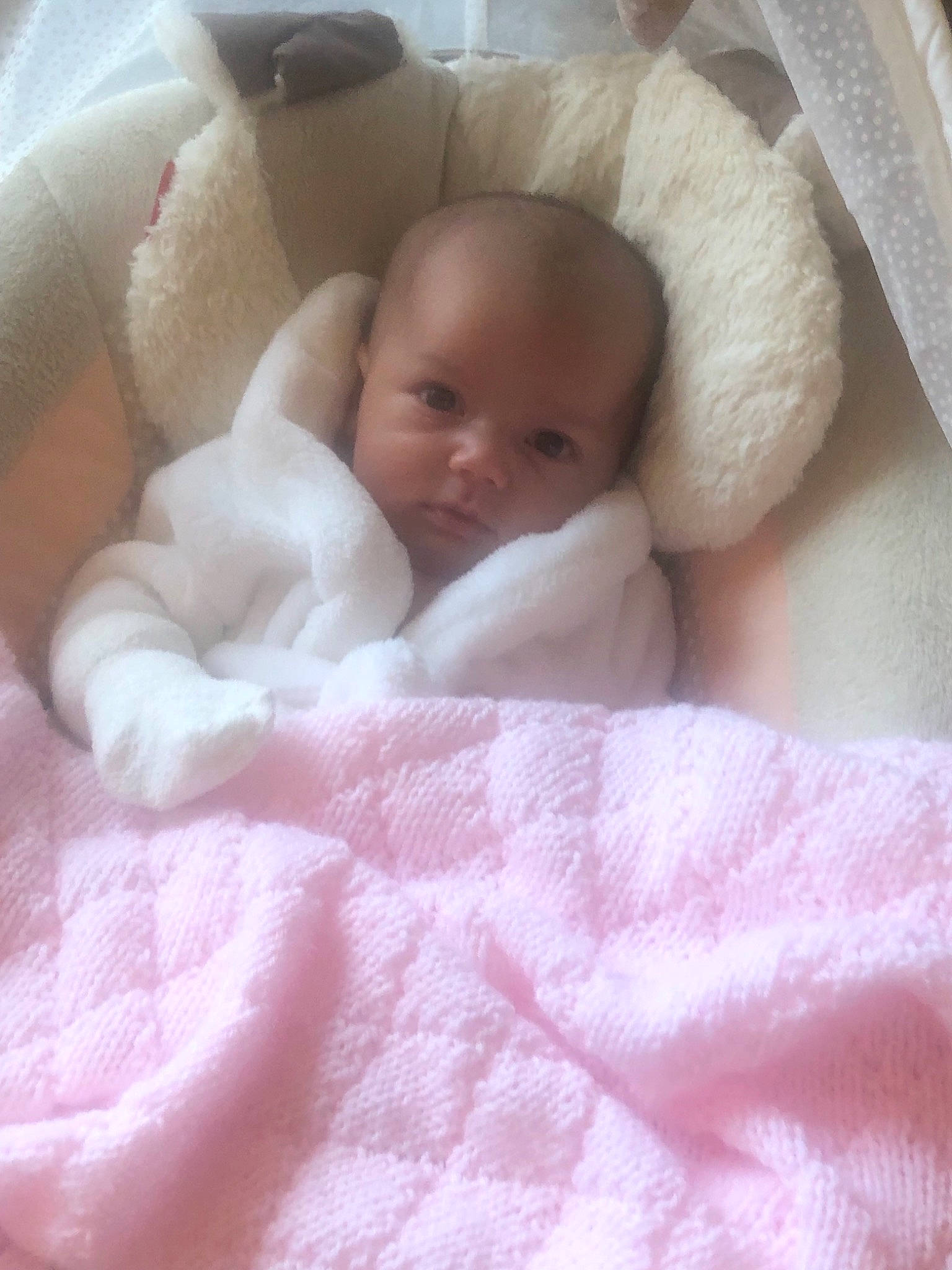 Emmaline joined the competition — help win amazing prizes! baby, baby_products, baby_sleeping, bedding, blanket, cheek, child, eye, face, head, infant_bed, linens, person, pink, product, skin, textile, toddler, white