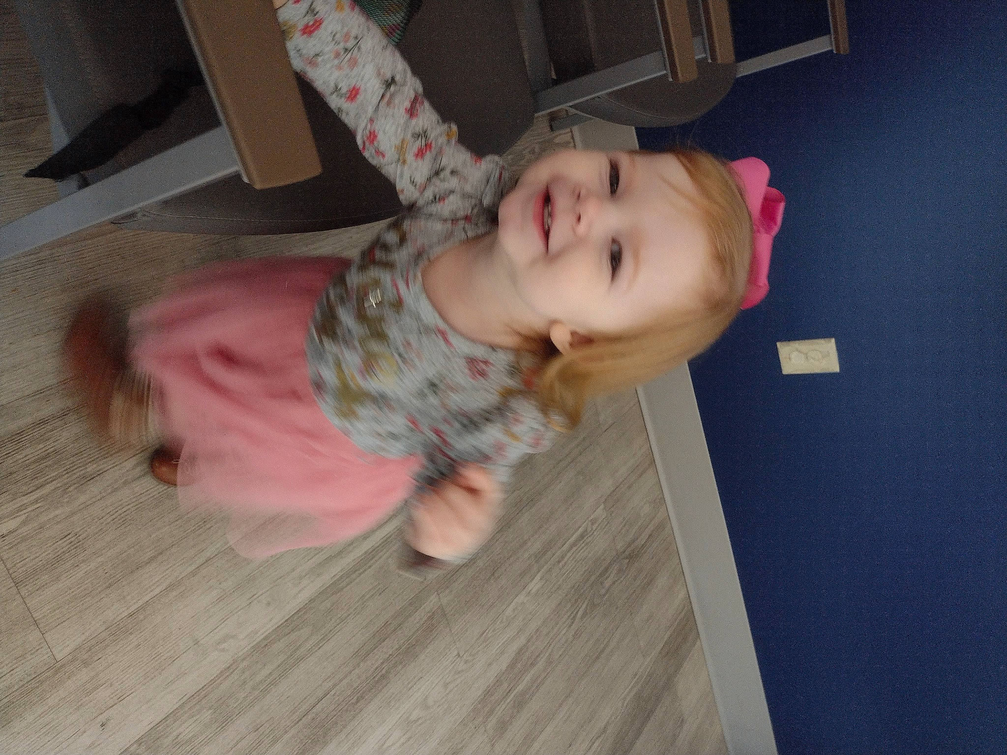 Aubriella is registered to the contest to win money with this photo: baby, baby_toddler_clothing, cheek, child, comfort, floor, flooring, fun, hardwood, head, joy, laminate_flooring, nose, person, pink, room, skin, smile, toddler, varnish