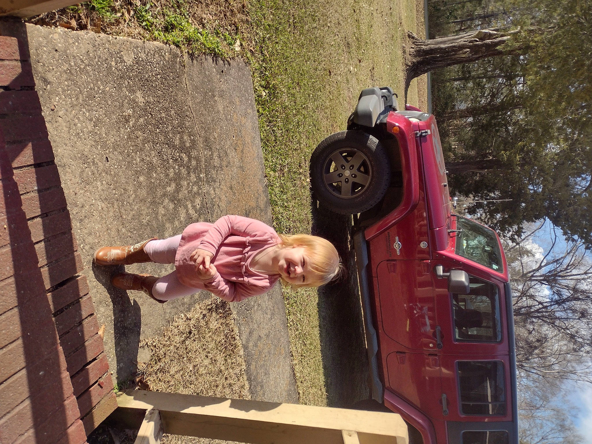 Aubriella is registered to the contest to win money with this photo: auto_part, automotive_exterior, automotive_lighting, automotive_tire, automotive_window_part, baby, bumper, car, fun, joy, leisure, magenta, motor_vehicle, person, pink, tire, toddler, travel, tree, vehicle