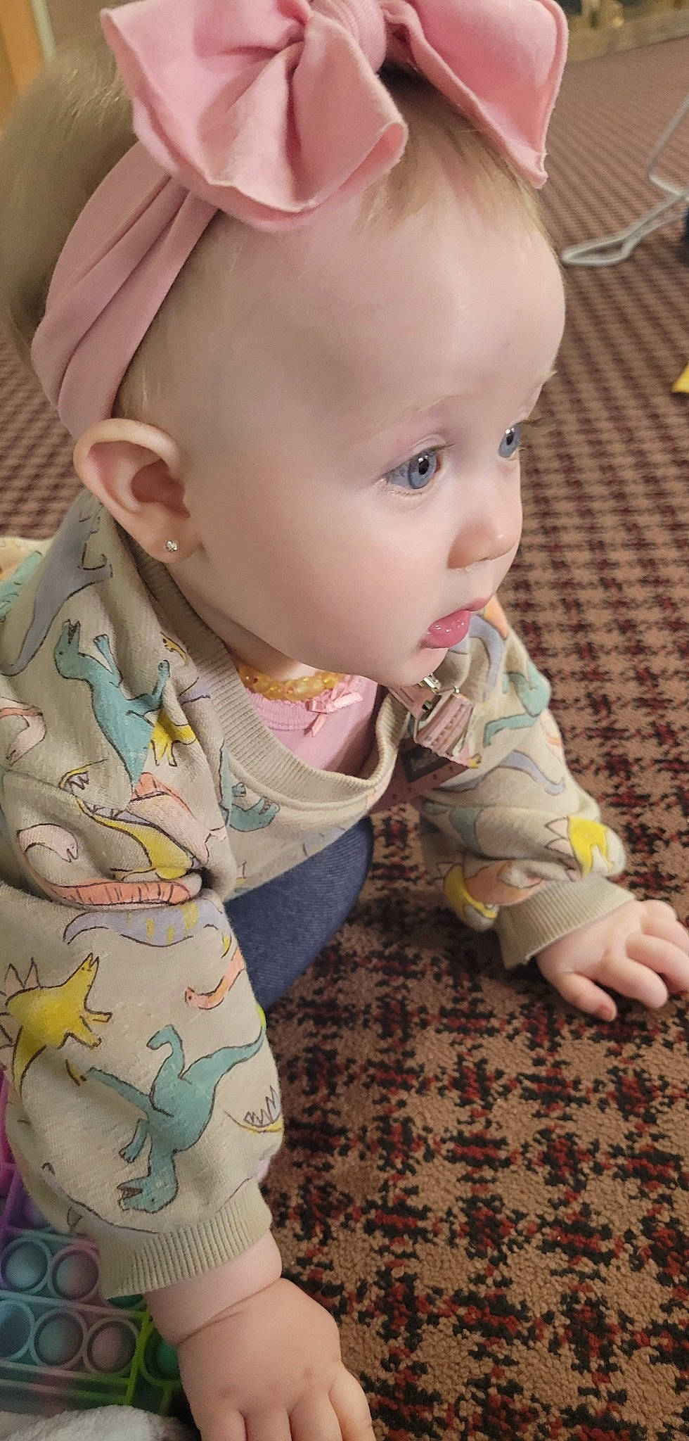 Breleigh is registered to the contest to win money with this photo: arm, baby, baby_toddler_clothing, cheek, chin, clothing, dress, eye, finger, flooring, grass, hand, iris, lip, mouth, nose, person, product, skin, sleeve