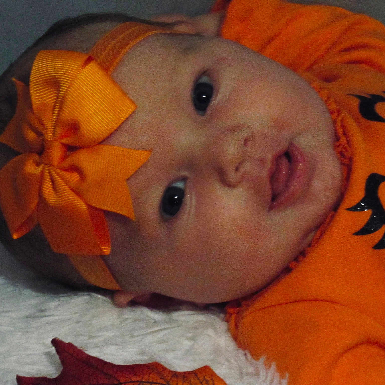 Miabella is registered to the contest to win money with this photo: baby, bedtime, cheek, child, ear, eye, face, head, leaf, lip, mouth, nose, orange, skin, toddler, yellow